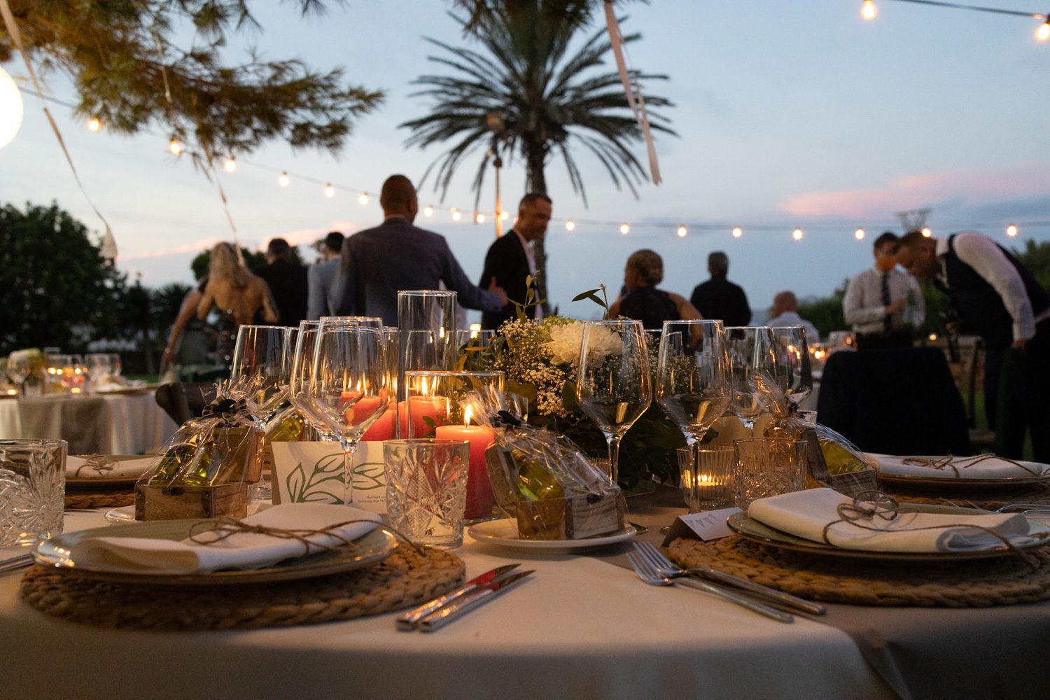 Long outdoor dinner table at sunset on Mallorca.