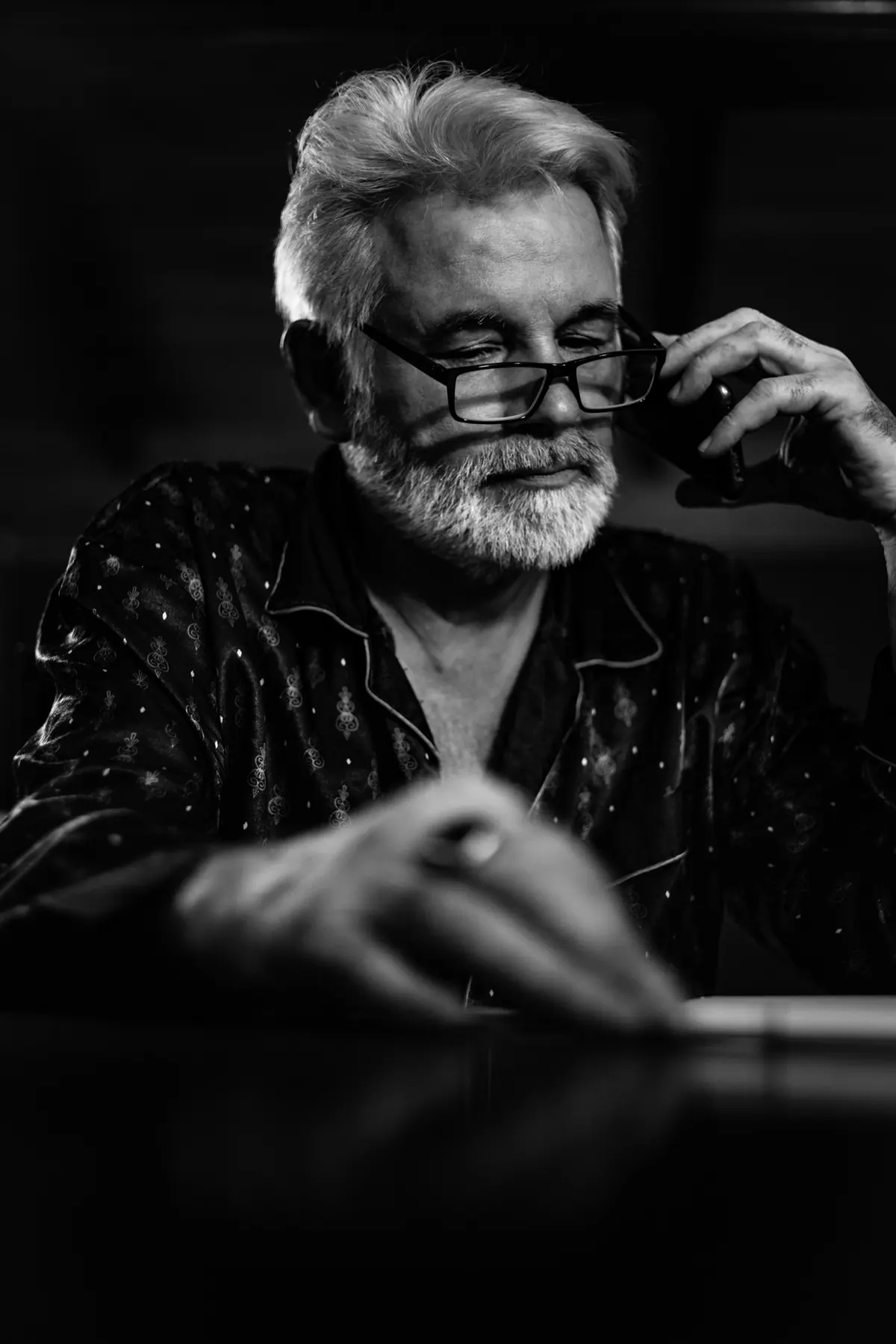 Black and white portrait of a man in glasses