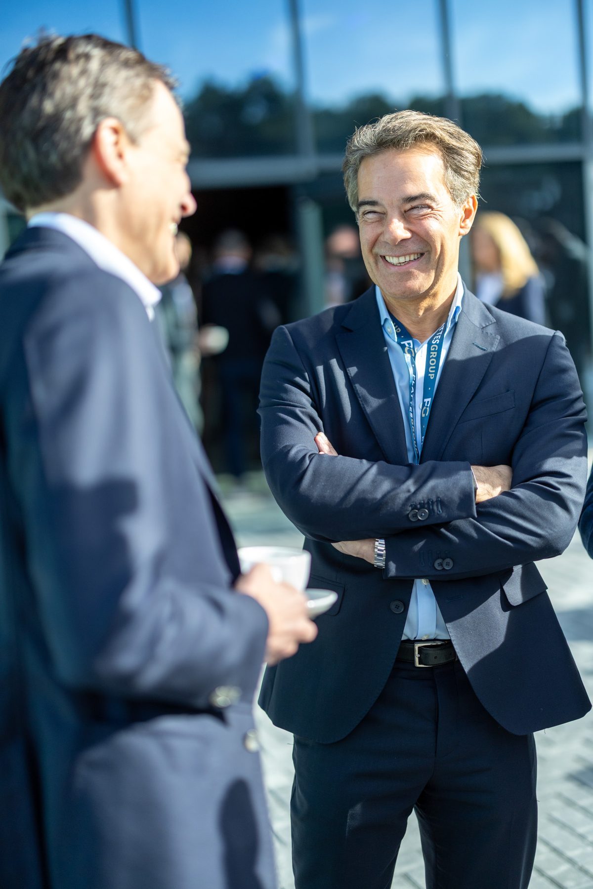 Business guests talking during a corporate event.