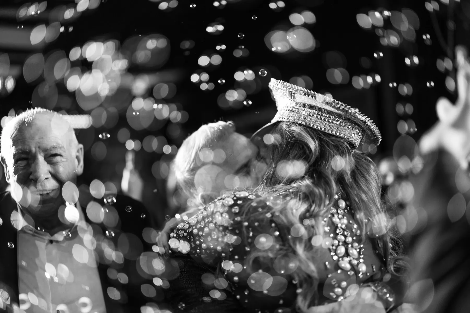 Black and white moment seen through bubbles and glass