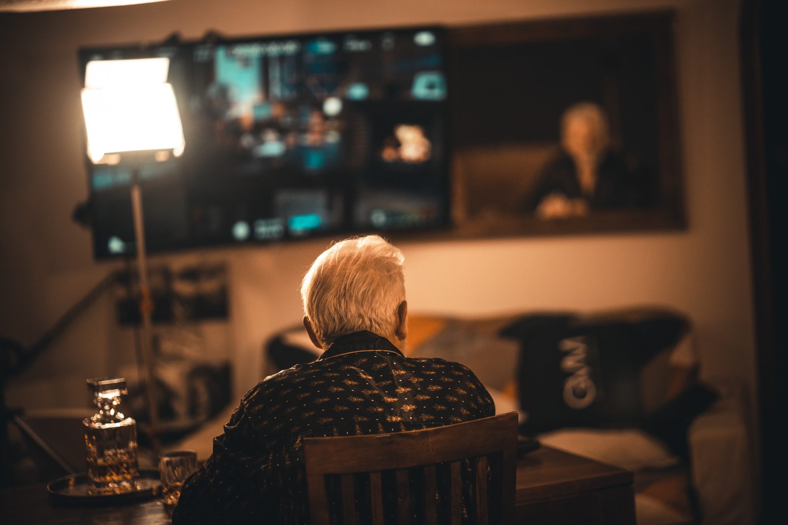 Behind the scenes during a filmed production.