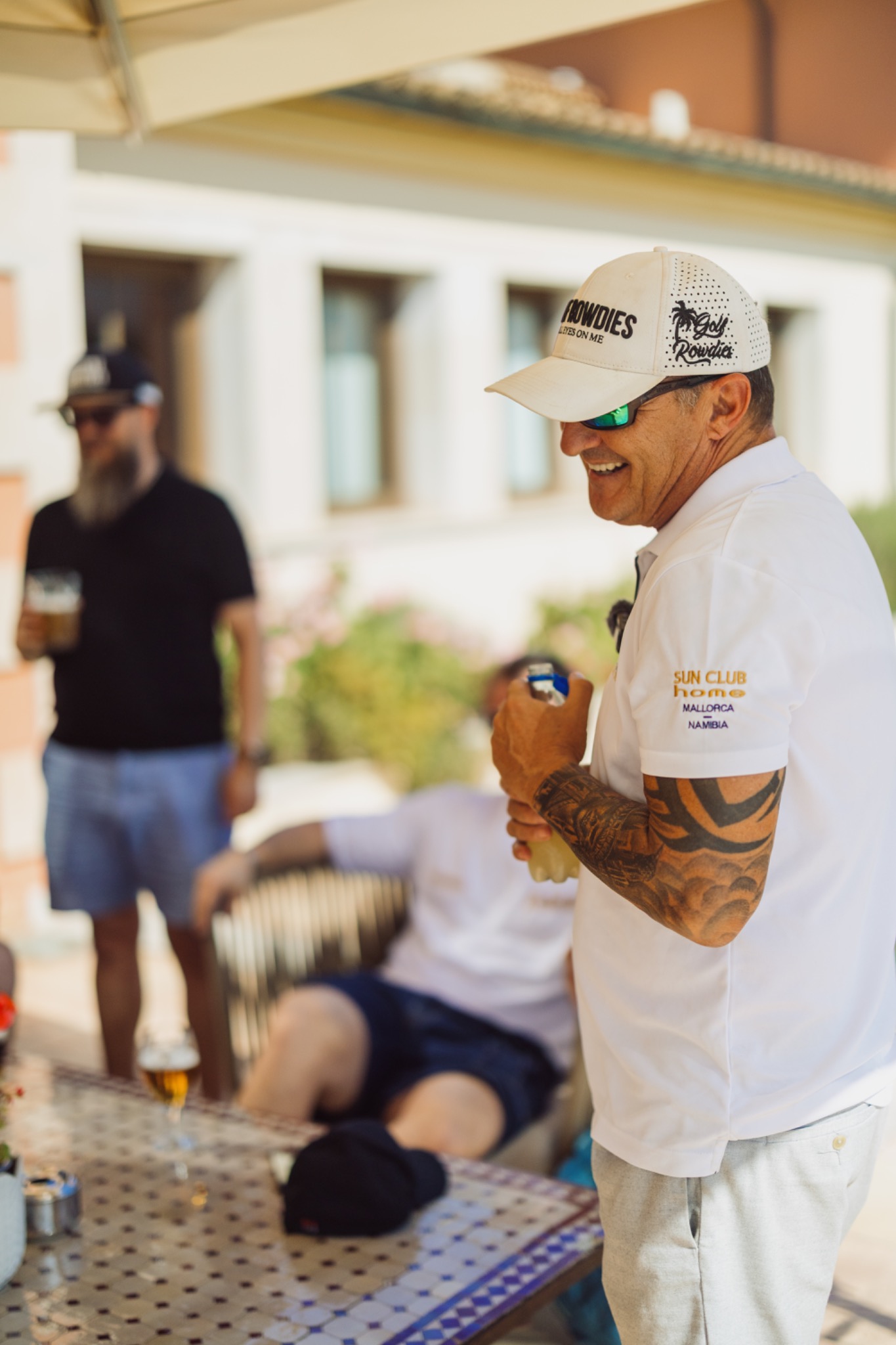 A participant standing with a golf club during the team-building event