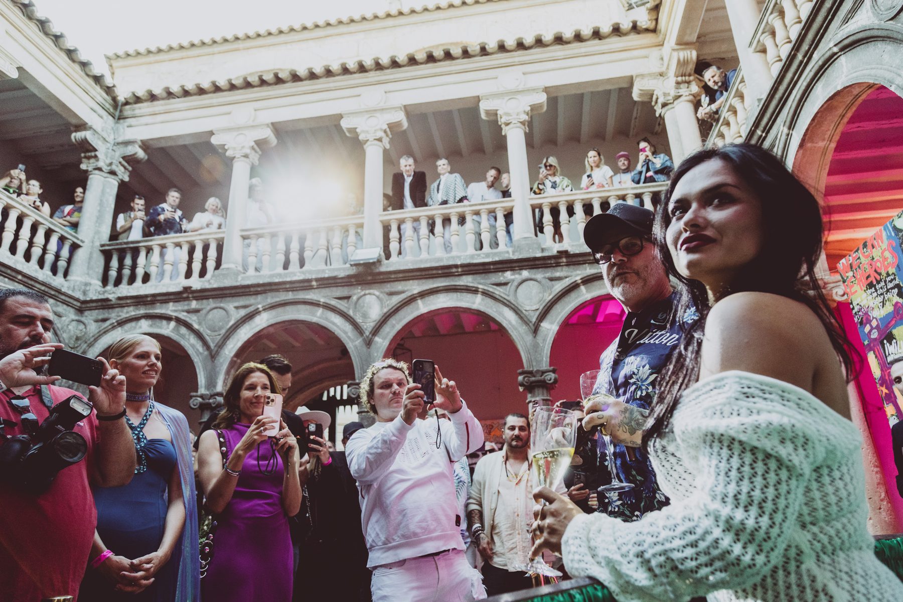 Guests gathering in an open courtyard during an event in Mallorca.