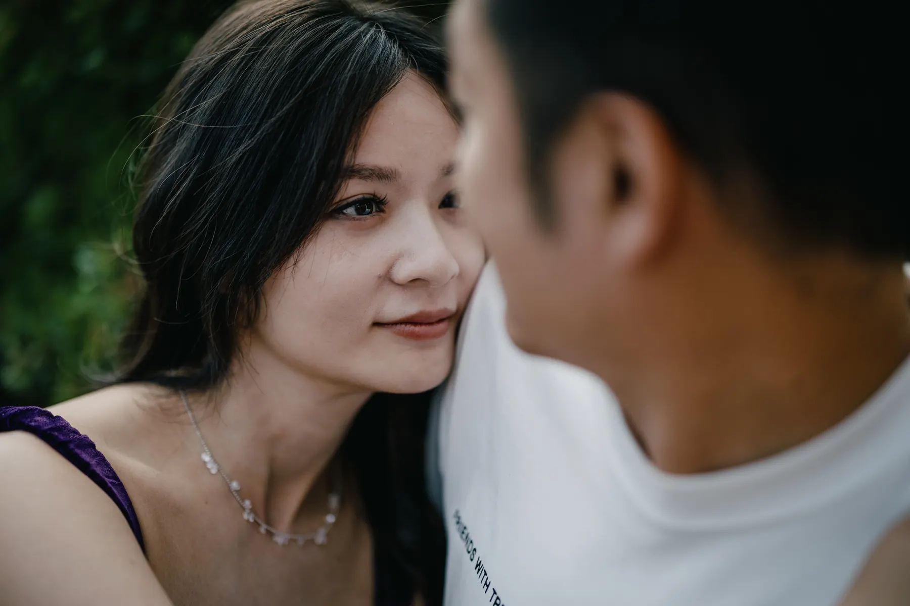 Couple looking at one another closely