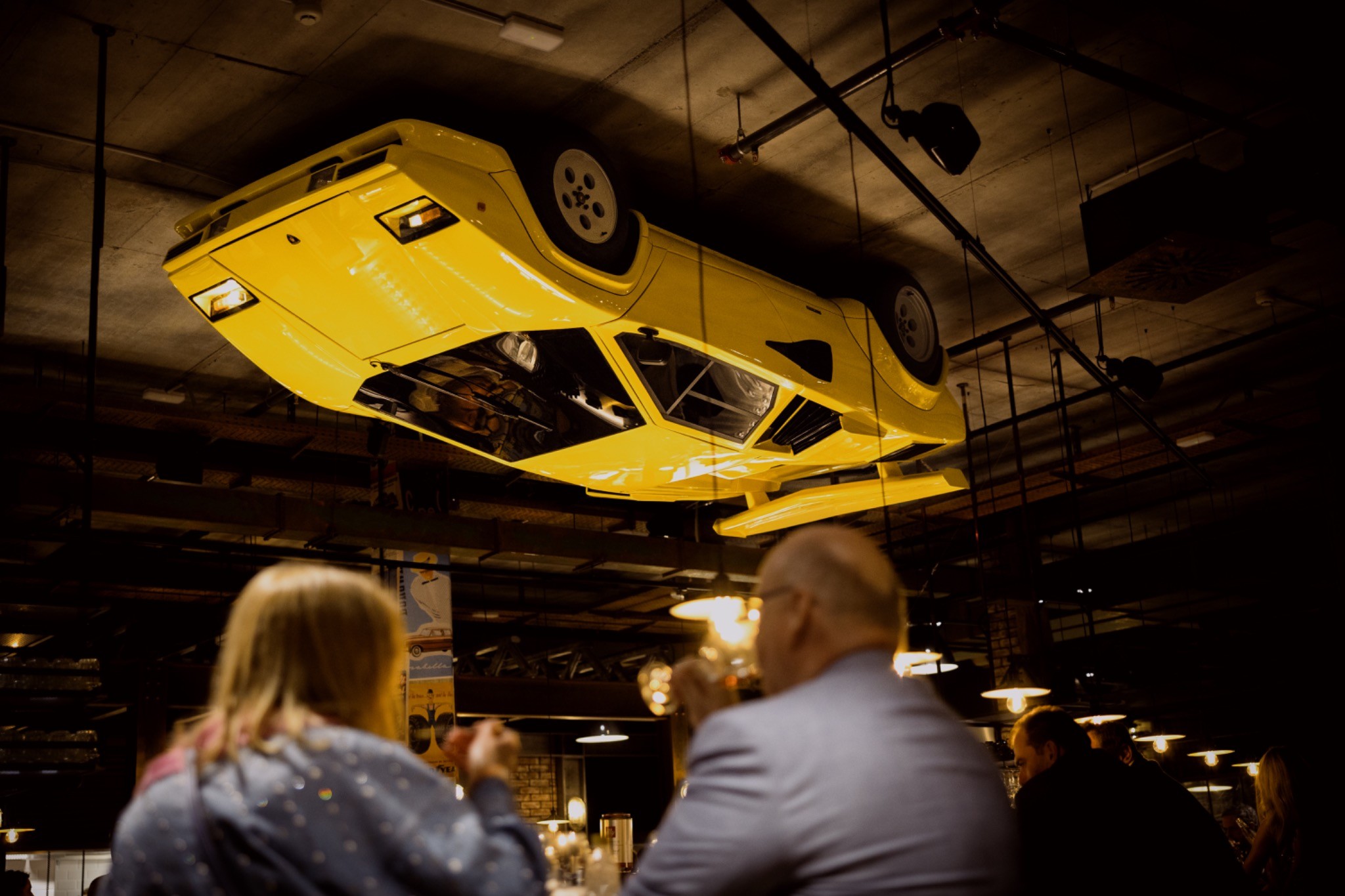 Audience applauding during the formal programme at Motorworld Mallorca